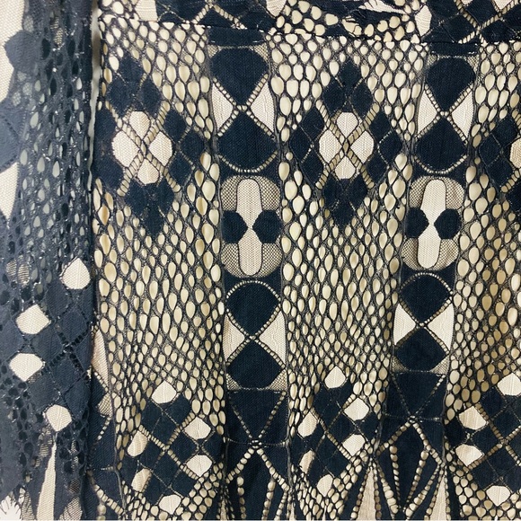 Free People deco lace black with cream underlay mini dress. Flared sleeves. 6 - Picture 7 of 11